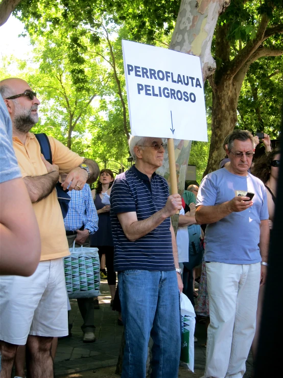 several people in the street holding signs