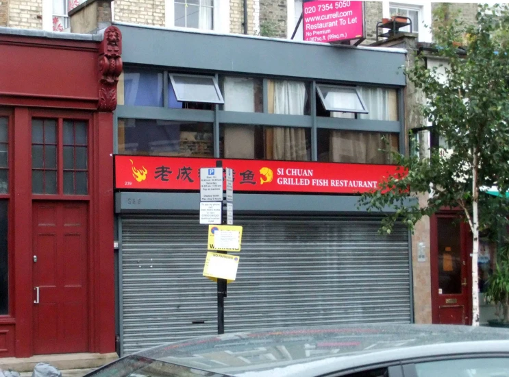 a shop is on the corner of a street corner