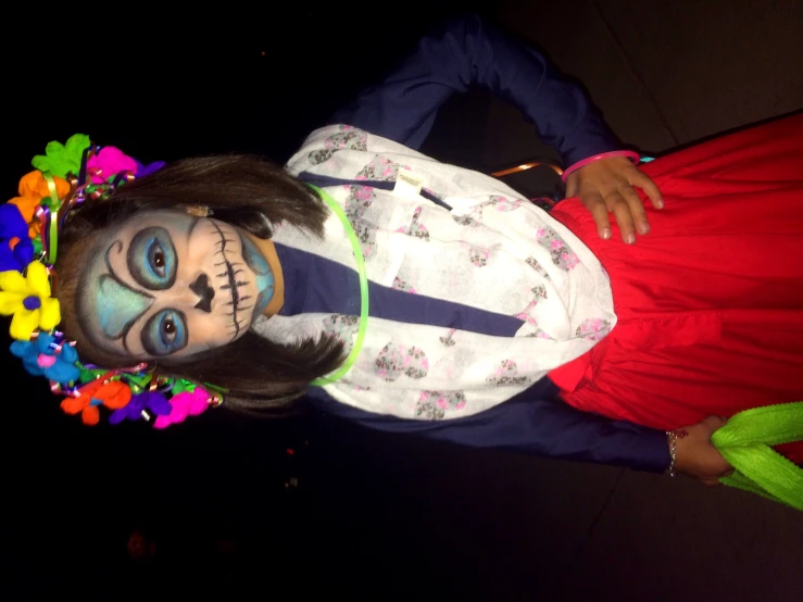 a young person in costume is dressed as a skeleton