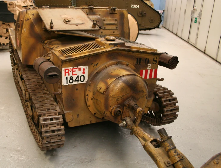 a rusty, war themed tank is shown