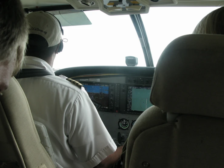 a small airplane with people inside of it