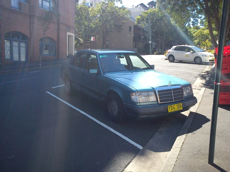 an image of a car driving in the street