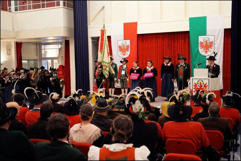 a group of people in uniform performing for people to watch