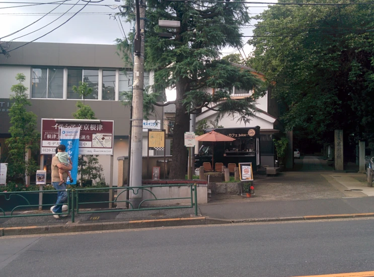 a man on the street near the parking lot