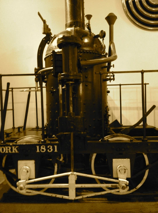 an old black and white pograph of a large locomotive