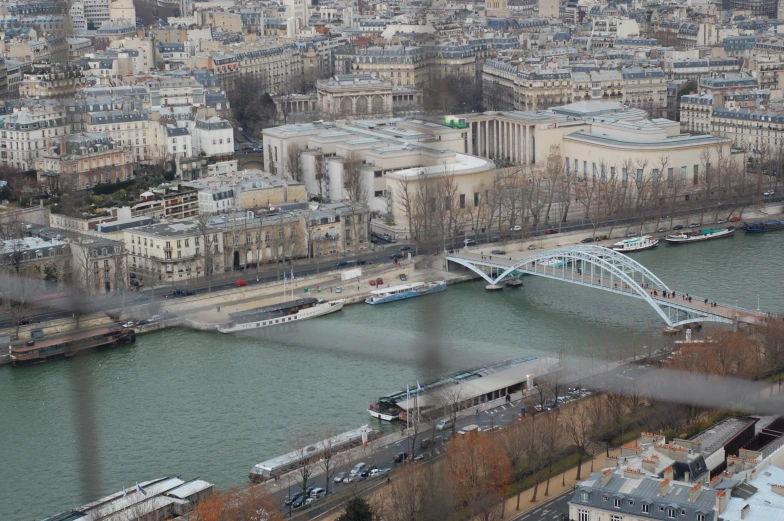 an aerial view of a city by the water