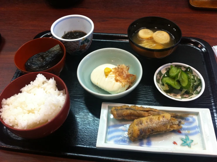 a tray that has different kinds of food on it