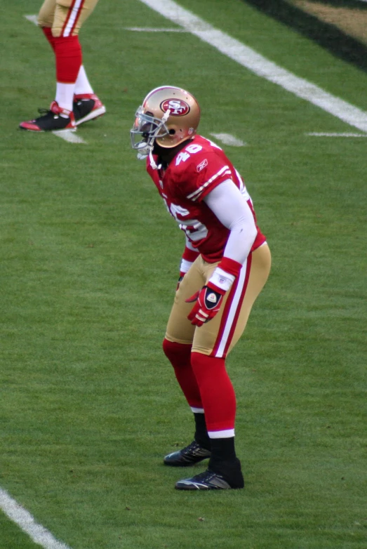a man with a uniform is on the field