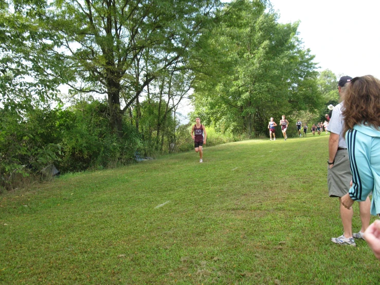 a bunch of people standing around and playing a game