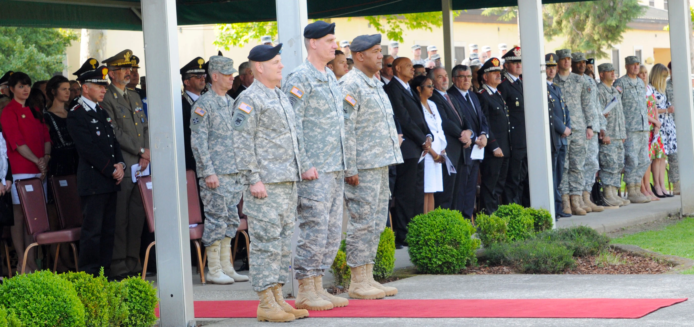 several soldiers lined up and watching other people