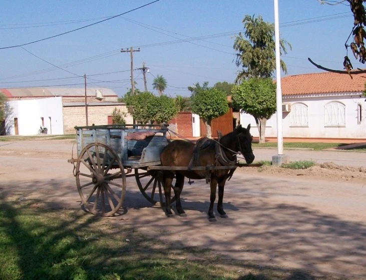 a horse is pulling a cart with people