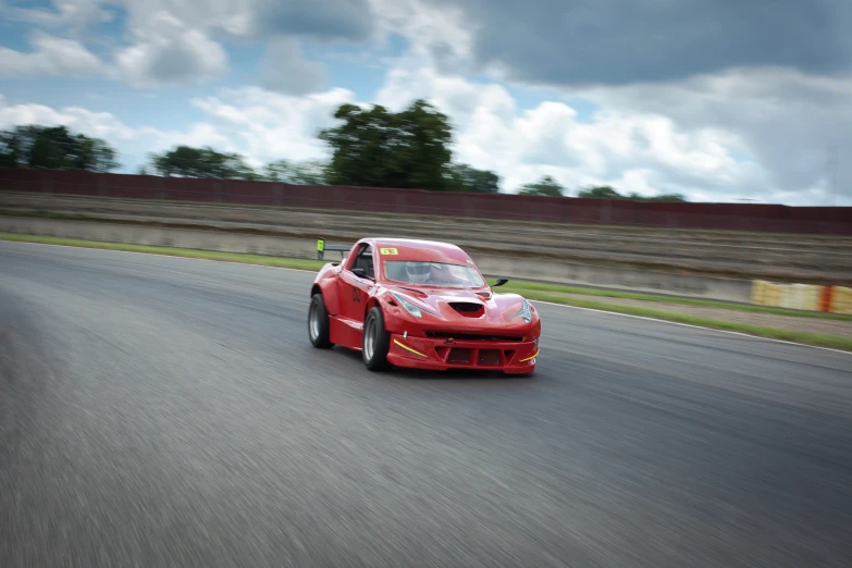 a racing car is driving down the track