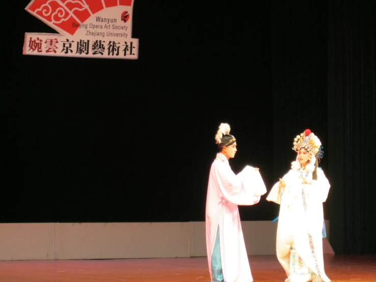 two women dressed in traditional japanese attire