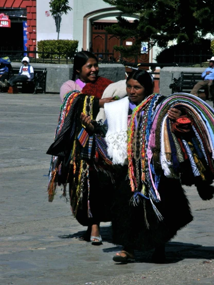 two women in costume walking along side each other