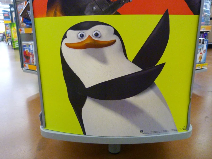 a penguin on top of a poster at the target