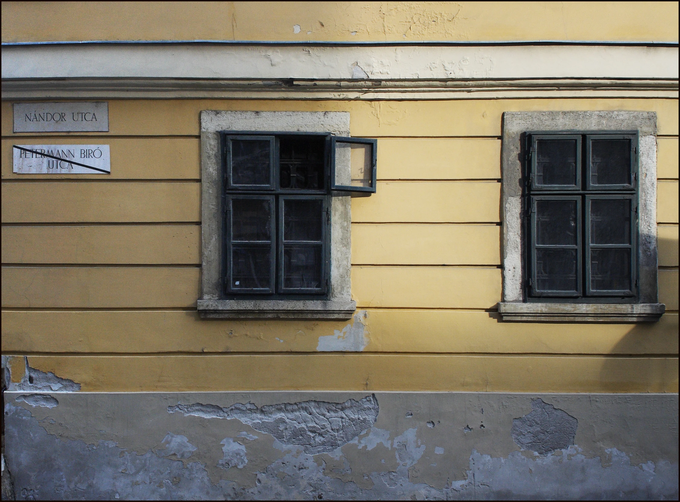 the windows of a building are empty