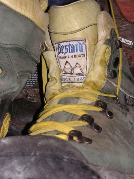 a pair of shoes sitting on top of a wooden table