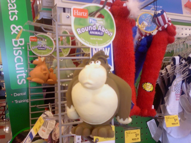 stuffed animal and tree decorations are for sale at the store