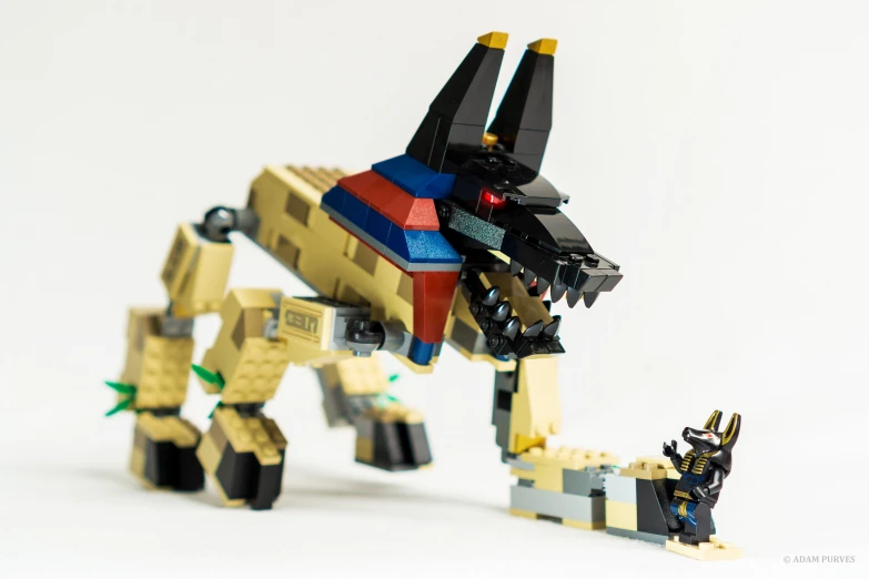 a lego horse carrying two small sheep toys