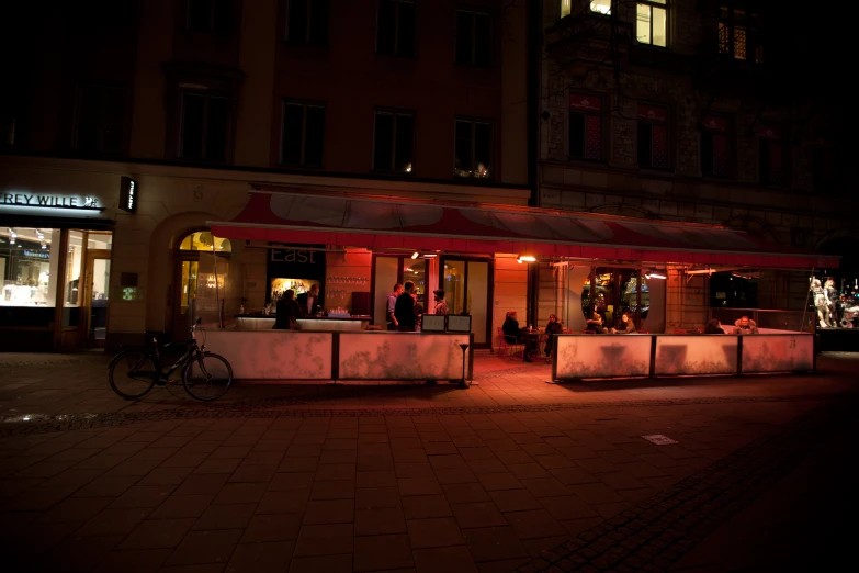 two bars at night in the street side