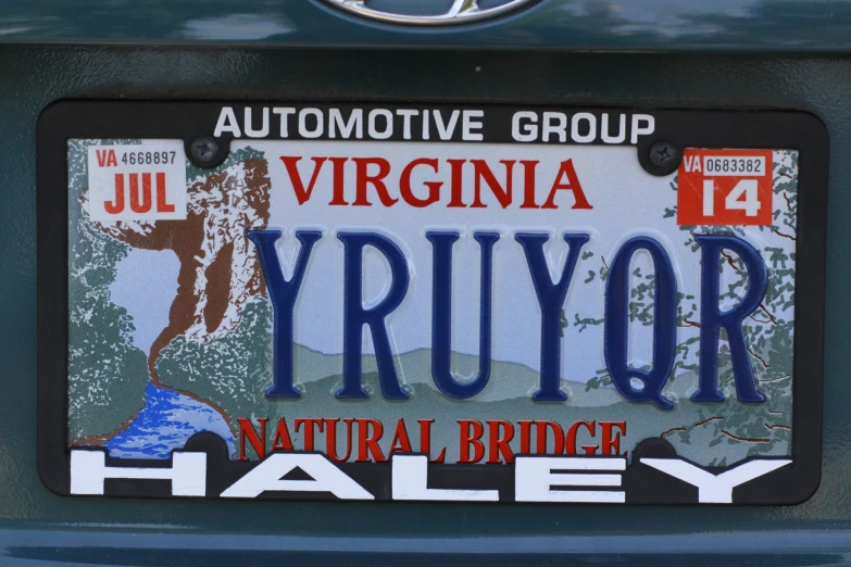 an license plate is posted on a vehicle