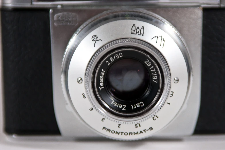 a old style camera is showing the top