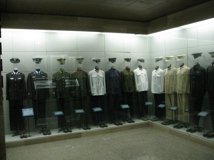 the uniforms in this display are for men and women