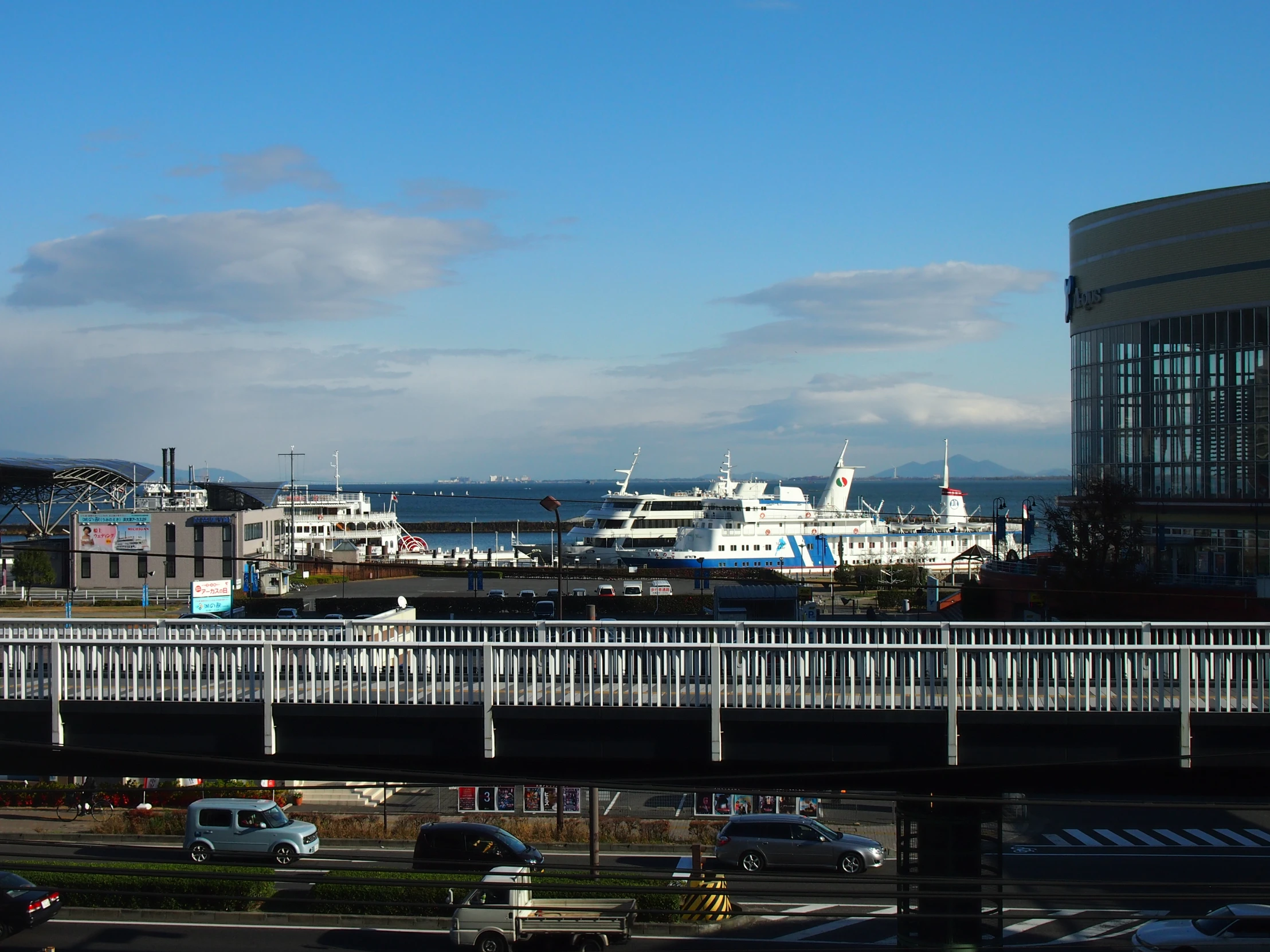 an elevated view of ships from across the water