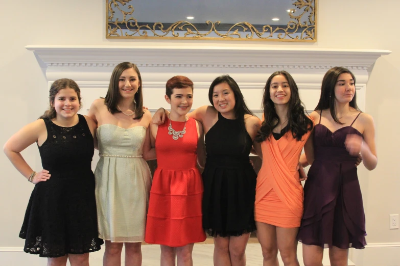 a group of women pose for a picture