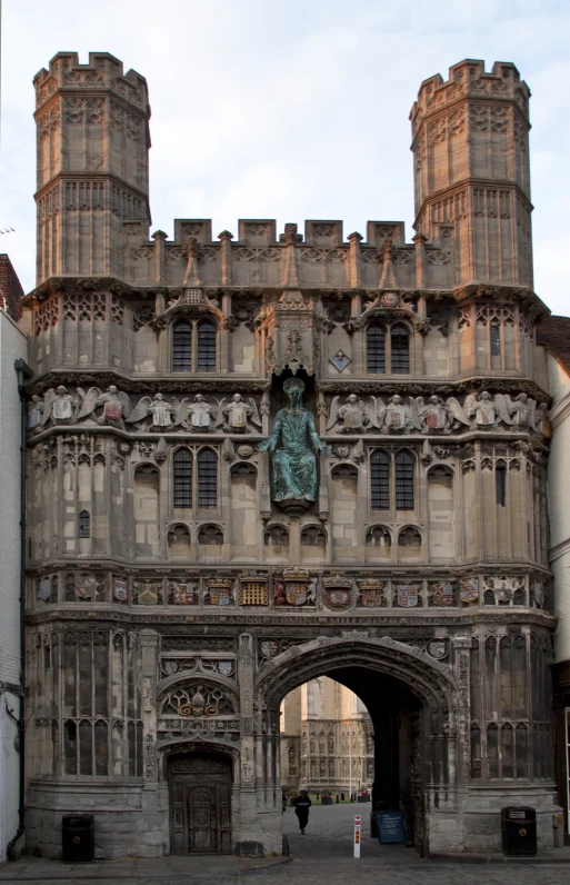 the large castle has a stone archway under it