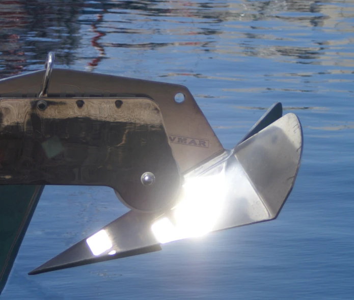 a boat's hull with a light shining through it