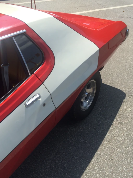 a close up s of the tail end of an older style car