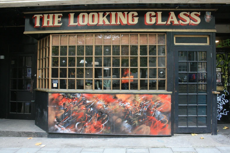 a store with a big window showing an advertit