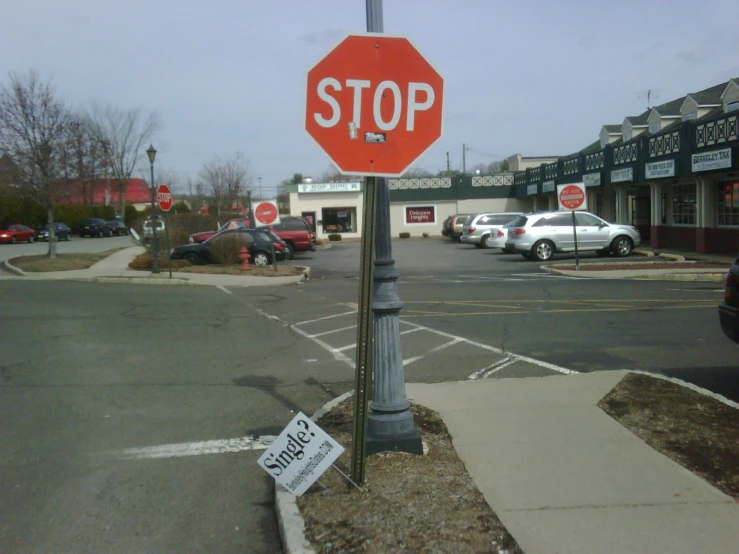 there is a stop sign and a sold out sign