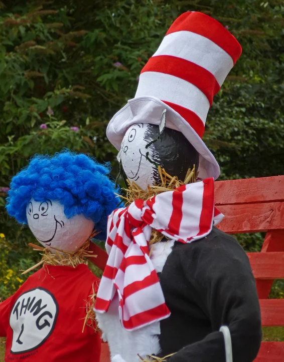 two people wearing cat in the hat costumes