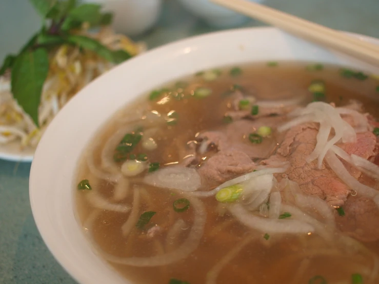 a close up view of soup in a bowl