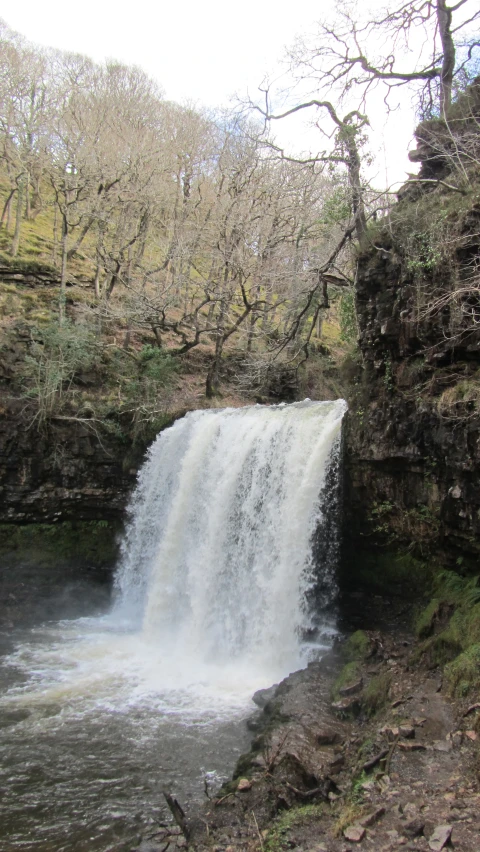 an image of a waterfall with water coming down it