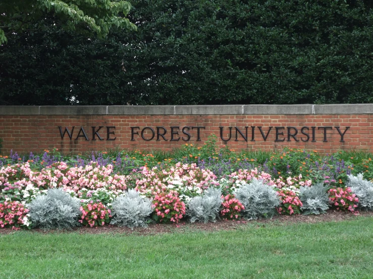 a large sign on the side of a brick building