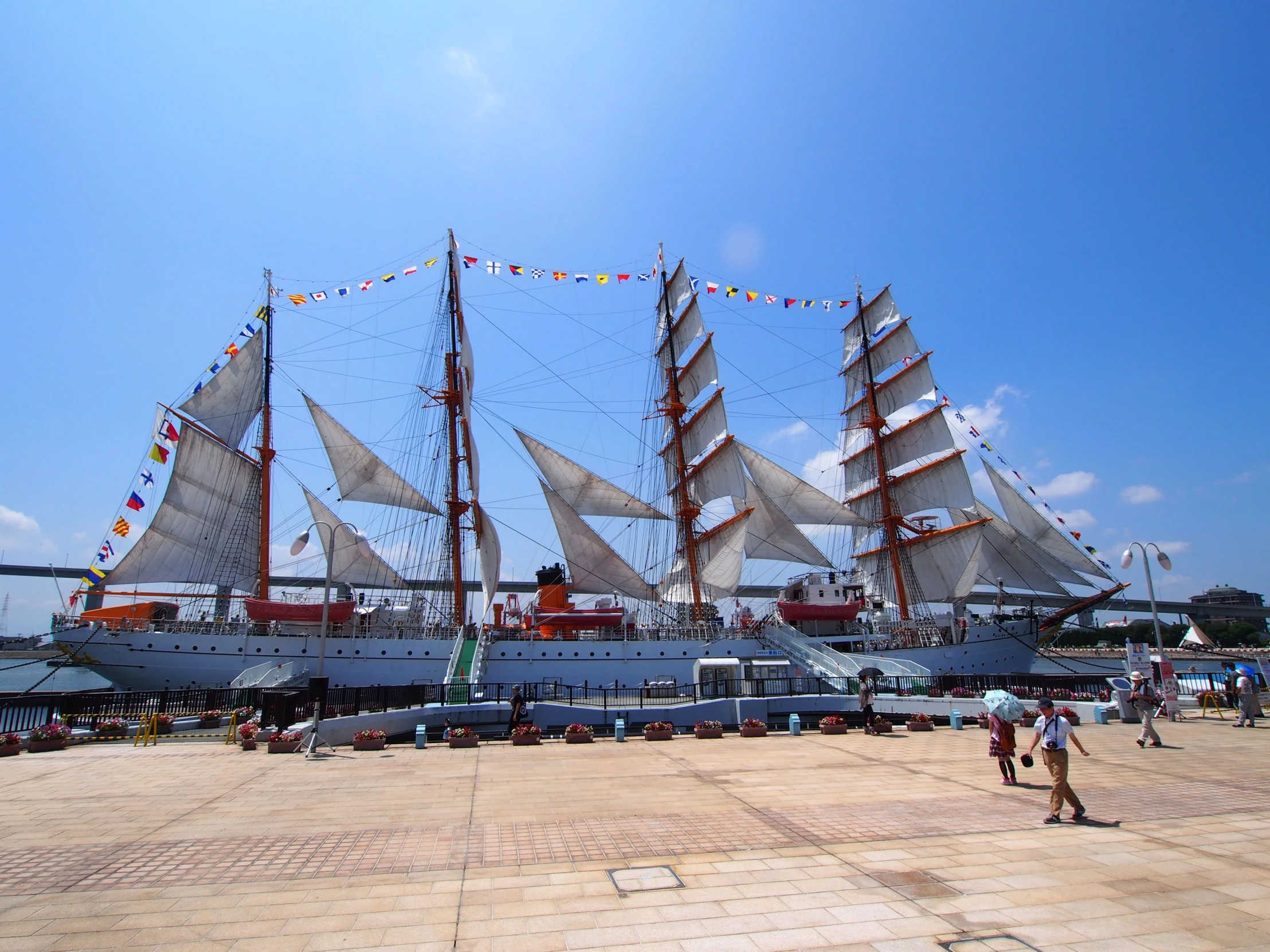 the huge sail boat is on display outside