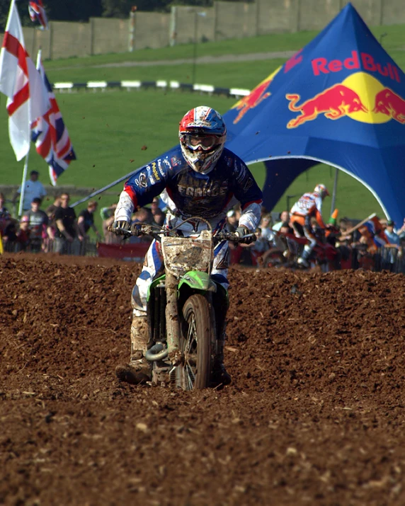a person is riding on a dirt bike