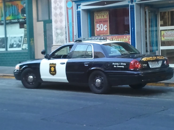 a police car parked on the side of a street