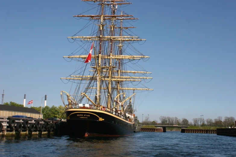 a large wooden ship that is in the water