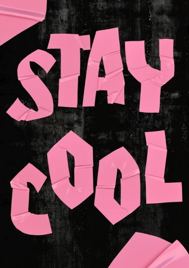 pink poster with torn words saying stay cool