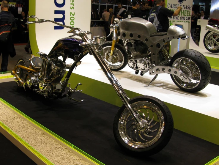 a custom bike sitting on display with a side car attached