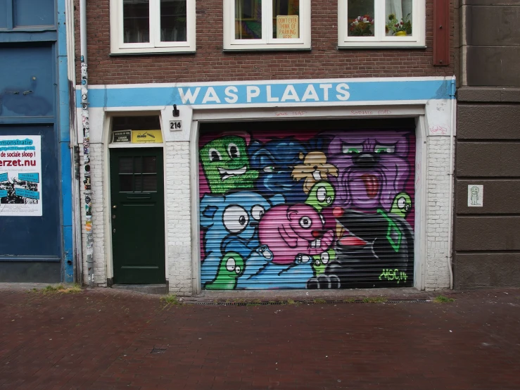 storefront with door of art and cartoon character