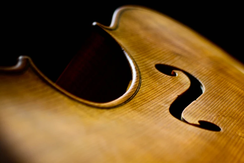 a closeup of the inside of a violin