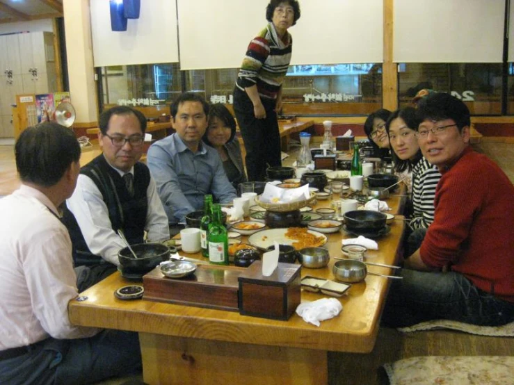 a group of people at a table eating