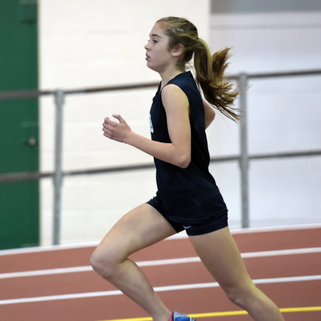 a  running on a track during a race