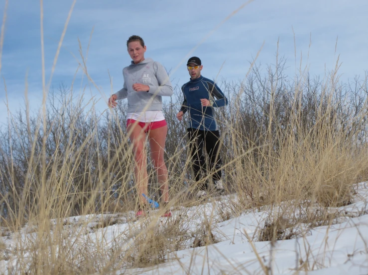 a person that is jogging in the snow