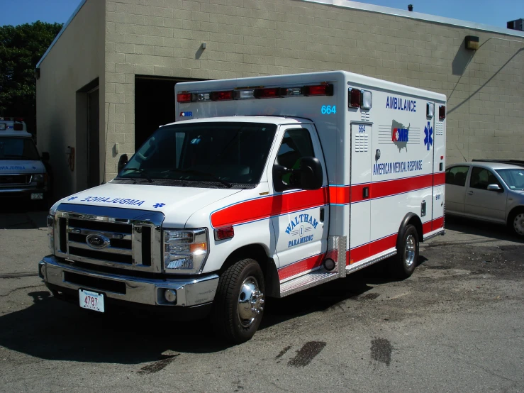 an ambulance parked in front of a building